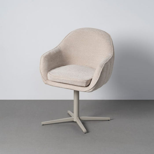 Arco upholstered swivel dining chair by IXIA